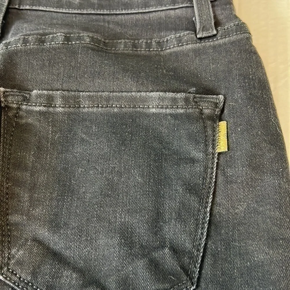 Vibrant black denim laces side mini skirt